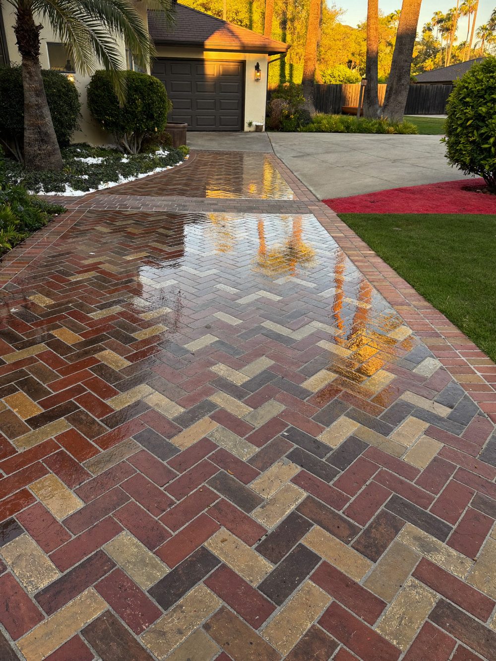 Freshly sealed paver driveway